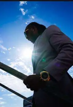 Alexander Mattison, former Minnesota Viking, wearing custom menswear styled by wardrobe expert Denise McBride in the Twin Cities.