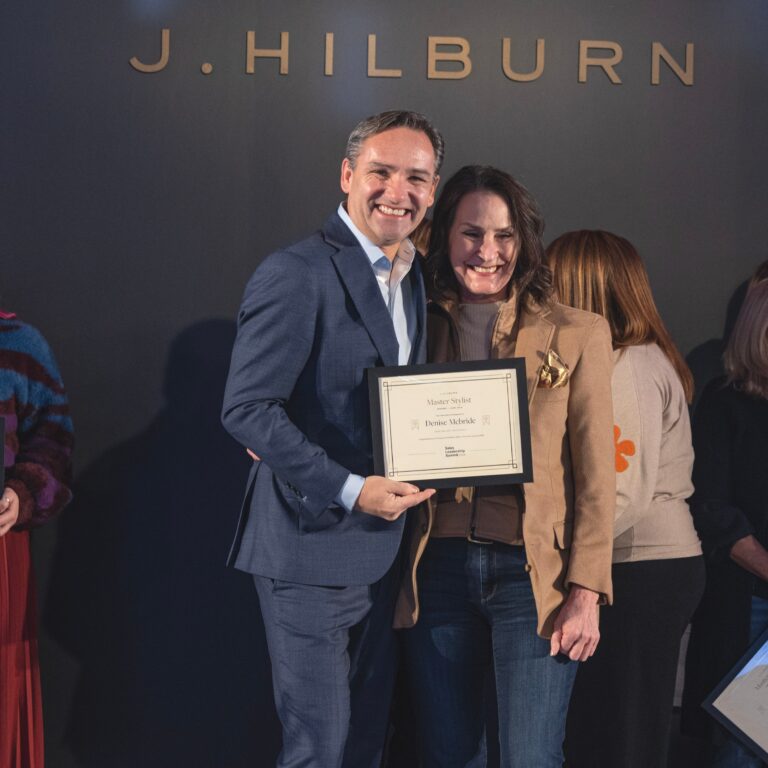 Earning J.Hilburn elite Master Stylist Certificate on stage at our annual J.Hilburn leadership summit