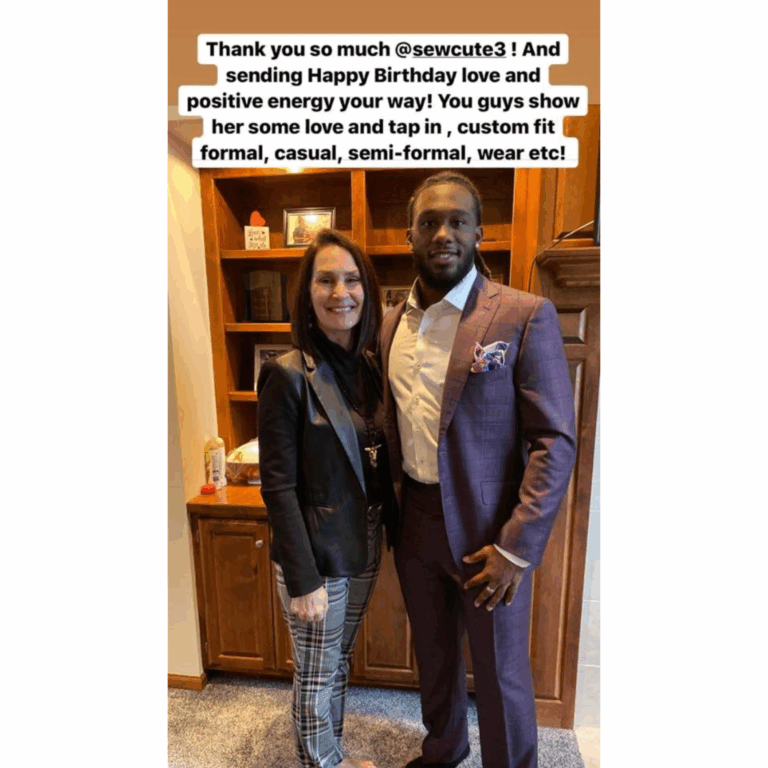Denise McBride standing next to NFL running back Alexander Mattison, who is wearing a custom J.Hilburn suit with a patterned pocket square.