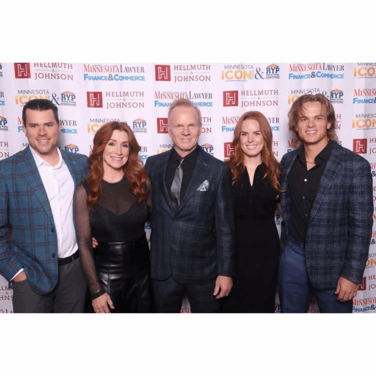 Family at red carpet legal event; men in custom plaid blazers and suits, styled by Denise McBride, celebrating Attorney of the Year award.